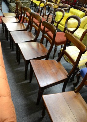 Lot 1389 - A set of seven mahogany plank seated chairs