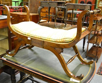 Lot 1409 - A 19th century mahogany double stool with twin reeded handles on shaped supports