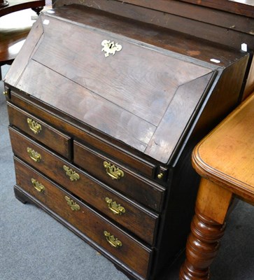 Lot 1420 - George III oak writing bureau