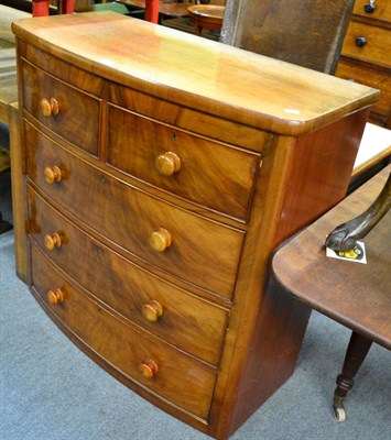 Lot 1423 - A Victorian mahogany bow fronted four height chest of drawers