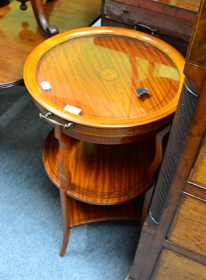 Lot 1439 - An Edwardian satinwood three tier etagere, early 19th century, circular removable tray top,...