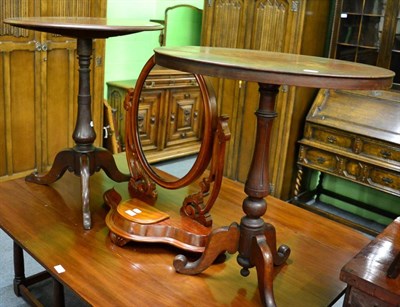 Lot 1440 - A mahogany tripod table, another Victorian example with oval top and a mahogany dressing table...