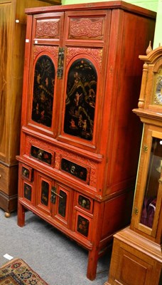 Lot 1450 - Chinese red painted cupboard with lacquered panels