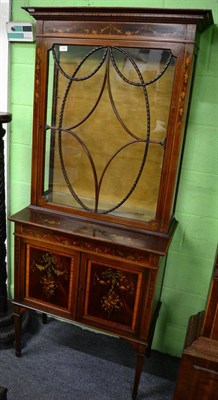 Lot 1458 - An Edwardian painted and inlaid mahogany display cabinet