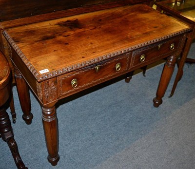 Lot 1474 - A side table fitted with two frieze drawers