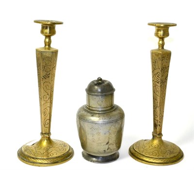Lot 25 - A Chinese pewter plum wine flask, Qing, 16cm high; and a pair of brass candlesticks with...