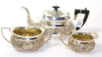 Lot 33 - A silver three piece tea service marked for Birmingham