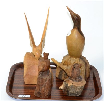 Lot 35 - A lime carved tern, by Ralph Williams, three others guillot, red wing warbler and a wren  Ralph...