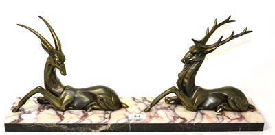 Lot 44 - An Art Deco bronzed stag and gazelle on a marble base