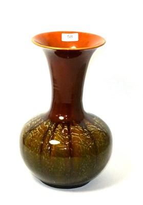 Lot 58 - A Linthorpe pottery flared bottle vase