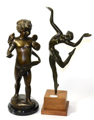 Lot 68 - An alloy figure depicting a nude female in balletic pose, oak base and a bronze figure...