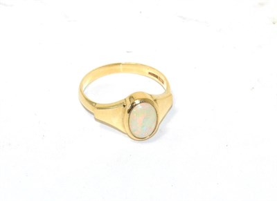 Lot 91 - A 9ct gold and opal set dress ring