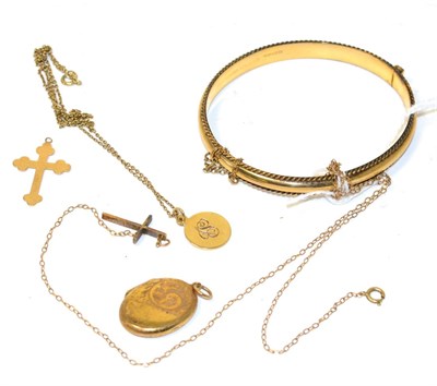 Lot 92 - A 9ct gold hinge opening bangle, a 9ct gold cross pendant on chain, another cross pendant, a...