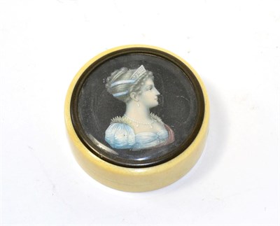 Lot 108 - A 19th century ivory circular box with inset painted miniature of a lady