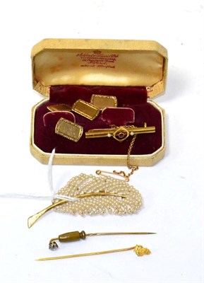 Lot 114 - A pair of 9ct gold cufflinks, a garnet and split pearl set brooch with an attached plaque...