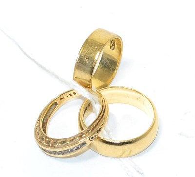 Lot 117 - Two 9ct gold band rings and a half hoop ring (3)