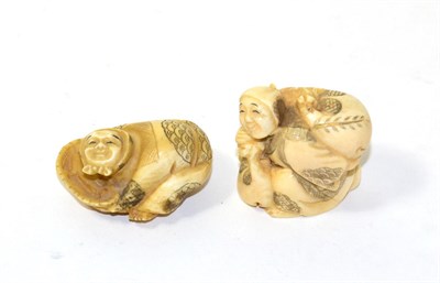 Lot 136 - Two early 20th century Japanese ivory figural netsukes