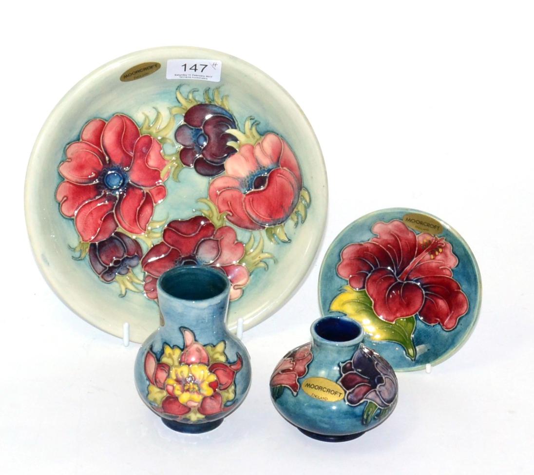 Lot 147 - A Walter Moorcroft Anemone pattern dish (21.5cm diameter), Hibiscus dish (11.5cm diameter), Anemone