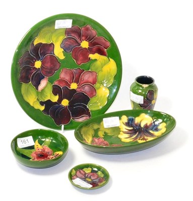 Lot 161 - A Walter Moorcroft Anemone pattern plate (26cm diameter), dish (8cm diameter) and vase (10cm...