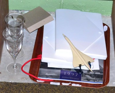 Lot 180 - Concorde memorabilia including two gift packs containing menu, postcard, certificates and...