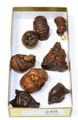 Lot 248 - Eight various early 20th century Japanese carved wood and ivory mounted netsukes and similar