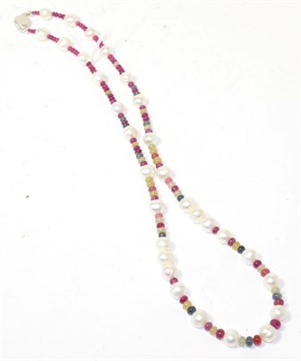 Lot 256 - A cultured pearl, ruby and coloured sapphire bead necklace, with ruby set clasp, 67cm long