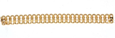 Lot 285 - A fancy link bracelet, stamped '750'