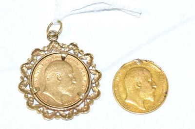 Lot 317 - An Edward VII half sovereign in frame and a 1909 half sovereign (2)