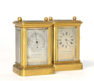 Lot 327 - A brass carriage timepiece and a aneroid barometer, both retailed by L.Fischer, R de la Prix, circa