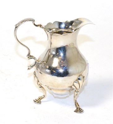 Lot 332 - An 18th century silver jug