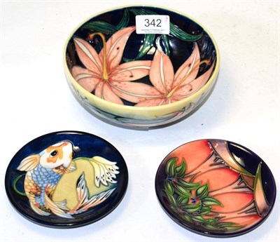 Lot 342 - A Moorcroft bowl by Phil Gibson, signed and dated 2004; with two pin dishes (3)