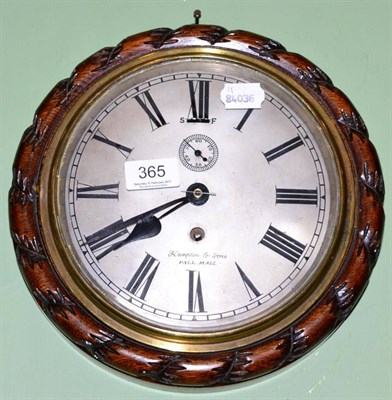 Lot 365 - A carved oak wall timepiece, silvered dial signed Hampton & Sons, Pall Mall