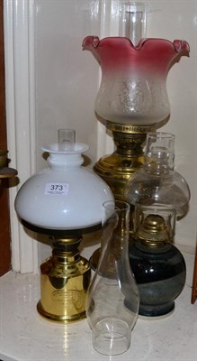 Lot 373 - Two oil lamps and a German railway lamp by G.V. Harnisch EFTF, Grundlagt 1842