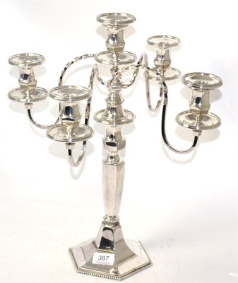 Lot 387 - A silver plate five light candelabra