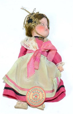 Lot 393 - A 1930's bisque head costume doll