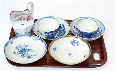 Lot 394 - A group of 18th century ceramics including two early Worcester tea bowls and saucers, another...