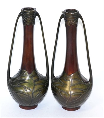 Lot 396 - A pair of Japanese twin handled bronze vases