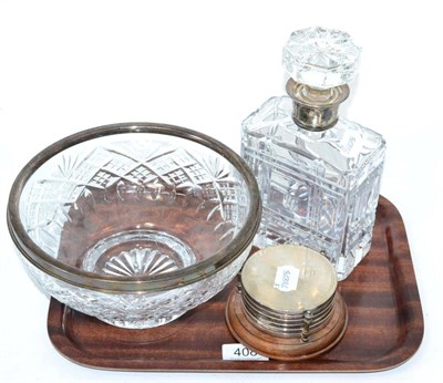 Lot 408 - A set of six silver mounted coasters in a stand, a silver mounted decanter and a silver mounted...