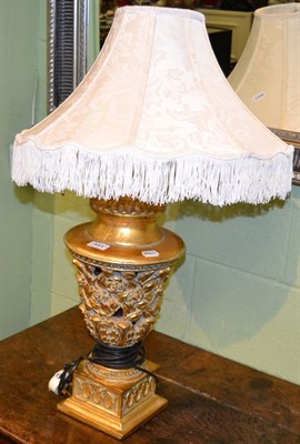 Lot 443 - A decorative gilt composition table lamp