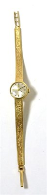 Lot 494 - A lady's 9ct gold wristwatch, signed Tissot, with a Tissot box