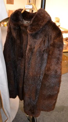 Lot 1010 - A brown musquash fur coat