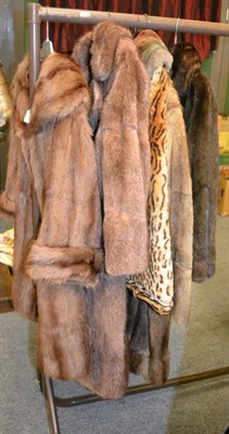 Lot 1056 - Short dark mink jacket, Harry Fish and Co Chesterfield musquash fur coat, two others, printed...