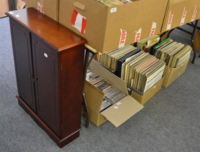 Lot 1094 - Eight boxes and a mahogany cabinet containing a quantity of LP's books and CD's