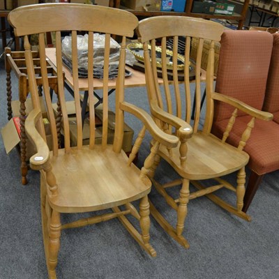 Lot 1158 - A pair of pine farmhouse rocking chairs