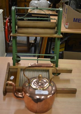 Lot 1164 - Triang child's mangle, a washboard and a copper kettle