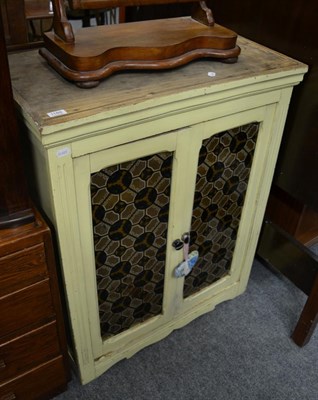 Lot 1189 - A French painted kitchen cabinet with reverse painted glass doors