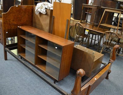 Lot 1190 - A burr walnut double bedstead with hoof feet