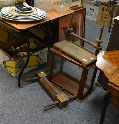 Lot 1201 - A quantity of collectables, light switches, two wooden presses, display cabinet etc