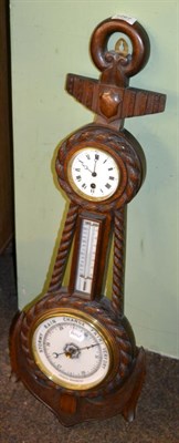 Lot 1267 - An oak naval themed aneroid barometer, combined with a thermometer box and time piece