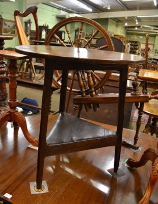 Lot 1300 - An oak cricket table